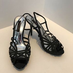 Nina New York sparkly high heels.